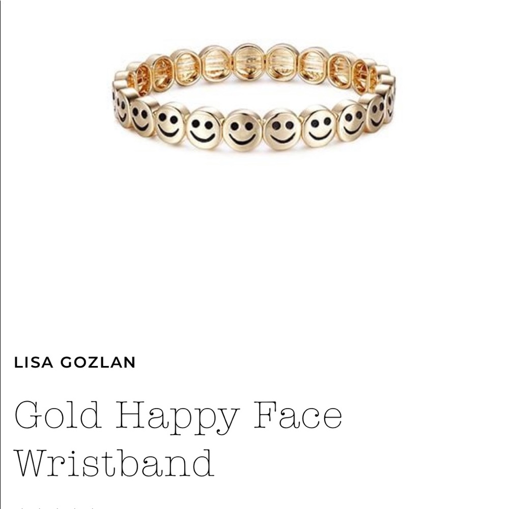 Gold happy face bracelet. Not my style. Never worn
